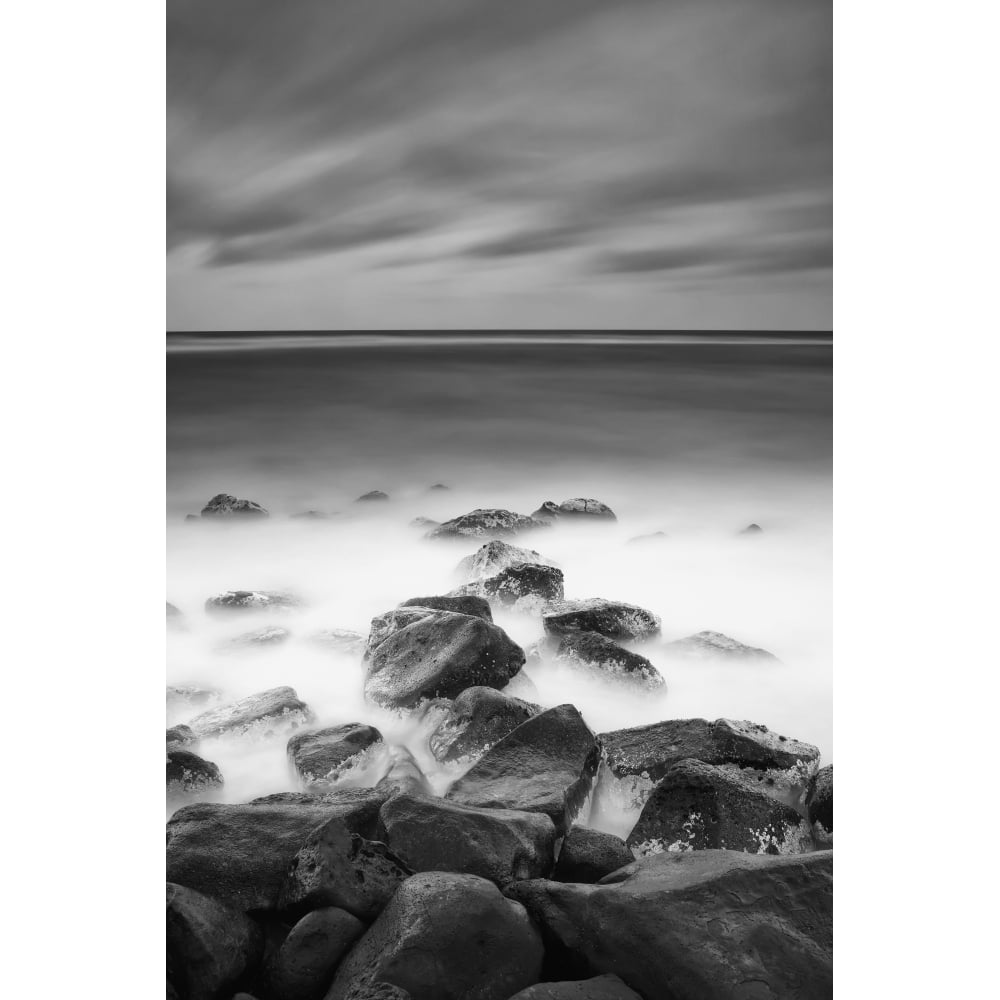 Long exposure of the surf along Wailua Beach processed in high contrast black Image 1