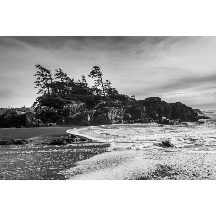 Tide coming in along the coast under a cloudy sky; Tofino British Columbia Canada Poster Print Image 1