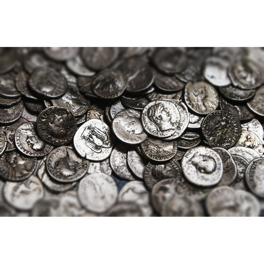 Roman coins in a pile; South Shields Tyne and Wear England Poster Print Image 1