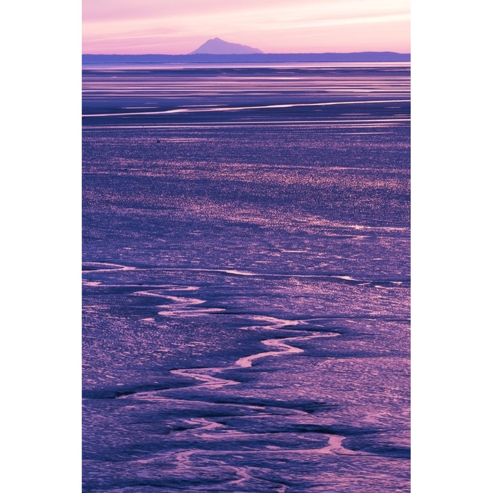 Colorful pink and purple sunset along Turnagain Arm at low tide with Mt. Redoubt in the background Southcentral Alaska Image 1