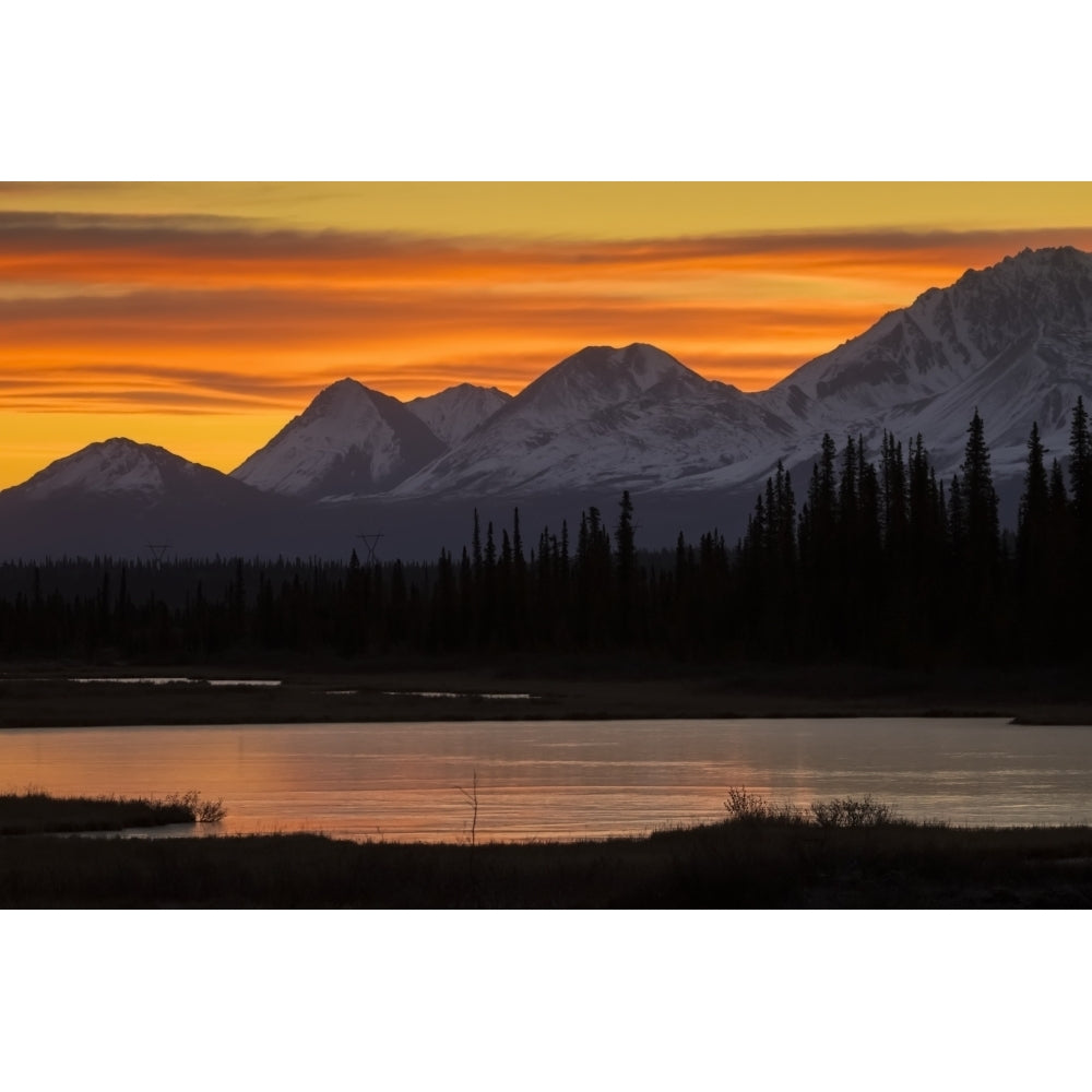 Sunrise over the pond and mountains along the Parks Highway in autumn near Cantwell in interior Alaska; Alaska United Image 2