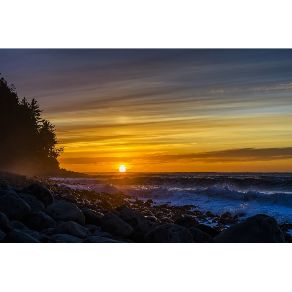 The sun sets over the ocean on the Oregon Coast; Seaside Oregon United States of America Poster Print by Robert L. Pot Image 1