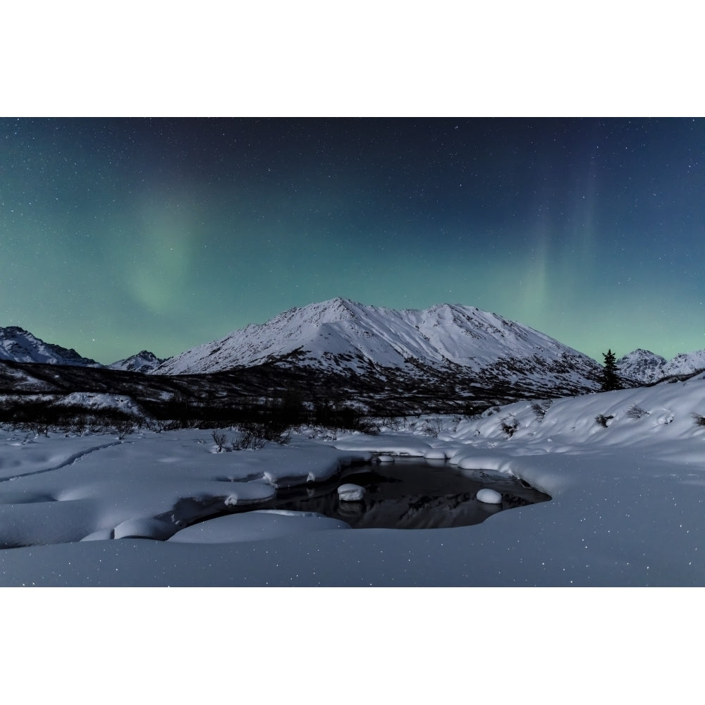 Aurora Borealis dance above Idaho Peak and the Little Susitna River at Hatcher Pass in winter South-c Image 1