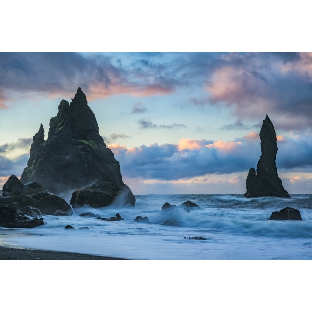 The Sea Stacks Known As Reynisdrangar With Waves And Sunrise Happening Above Them South Coast; Iceland Poster Print by Image 1