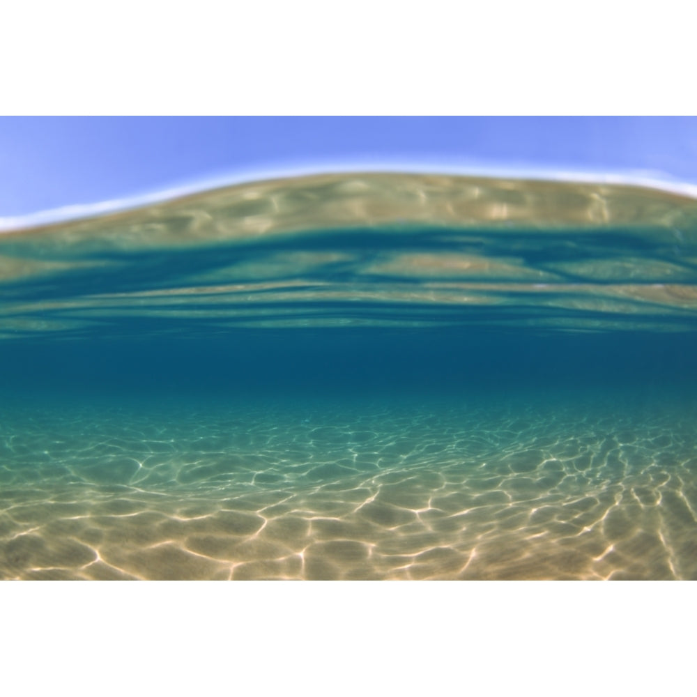 Split view of the blue sky ocean surface and underwater; Maui Hawaii United States of America Poster Print by Jenna Image 1