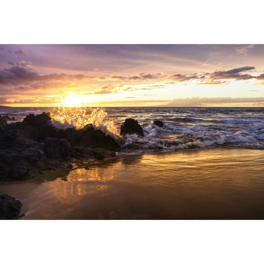 The sun sets with an ocean splash; Makena Maui Hawaii United States of America by Jenna Szerlag / Design Pics Image 1