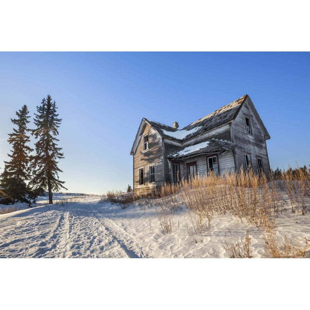 Dilapidated farm house at sunrise in winter near Winnipeg; Manitoba Canada by Susan Dykstra / Design Pics Image 1