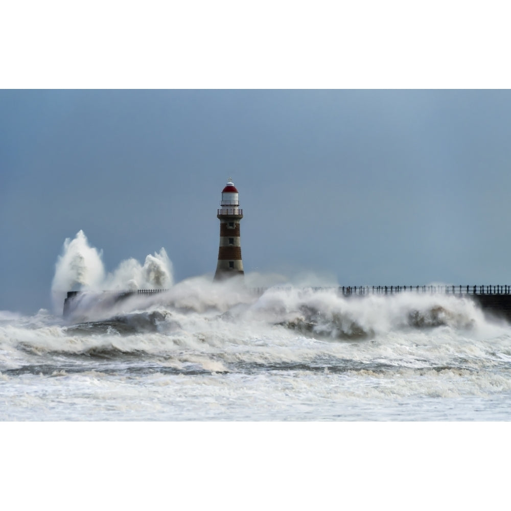 Roker Lighthouse and waves from the River Ware crashing onto the pier; Sunderland Tyne and Wear England by John Short / Image 1