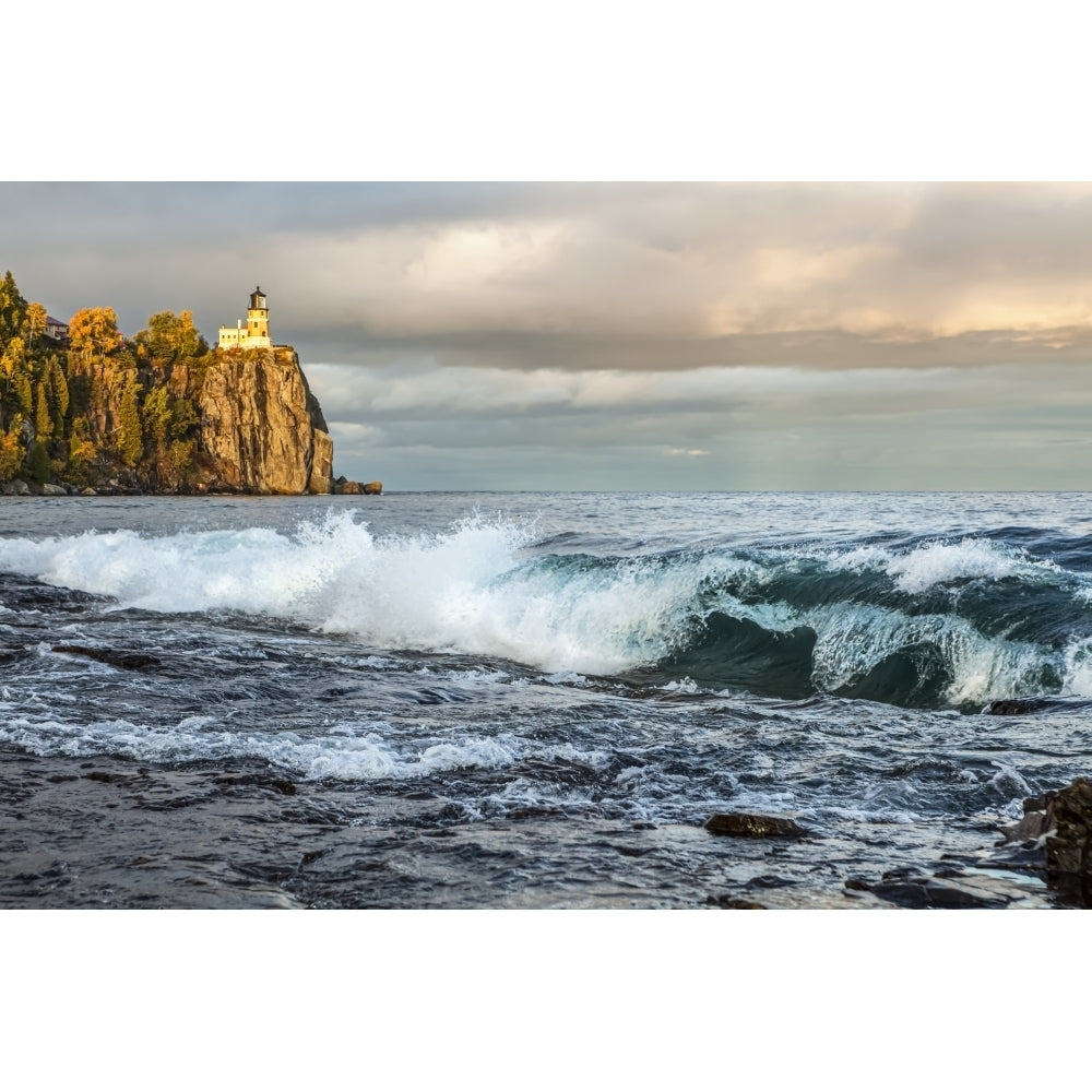 Split Rock Lighthouse with large waves on Lake Superior; Minnesota United States of America Poster Print by Susan Image 1