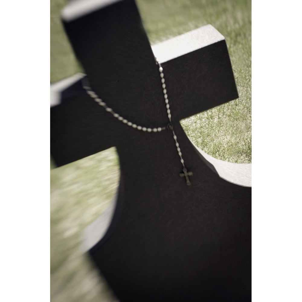 Rosary Draped Over A Gravestone Poster Print by Darren Greenwood / Design Pics Image 1