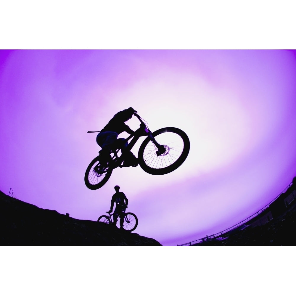 A Stunt Cyclist Silhouette Poster Print Image 1