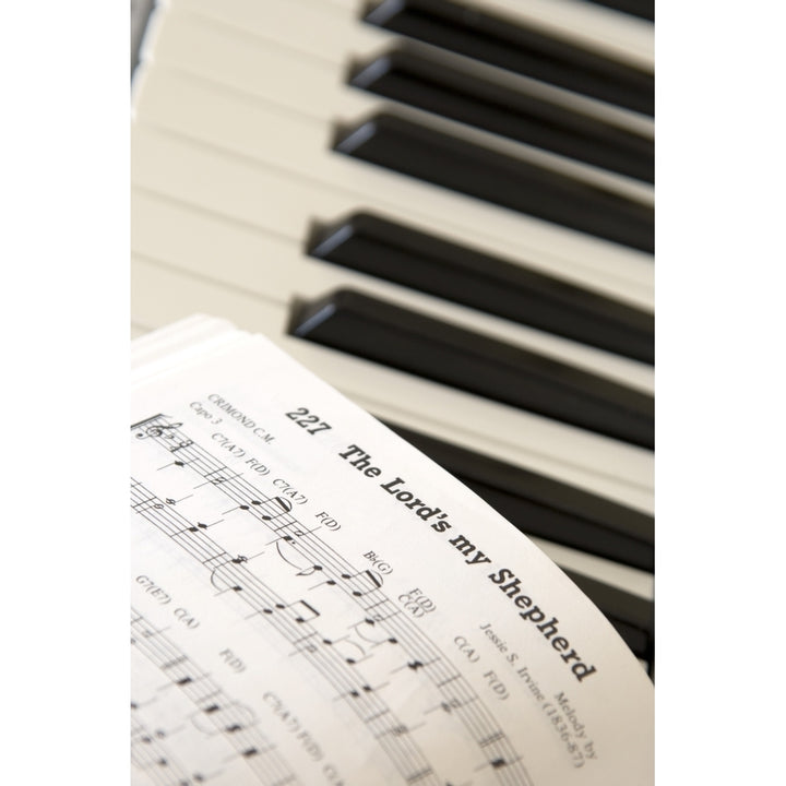 Close Up Of Sheet Music On Piano Keyboard Poster Print Image 1