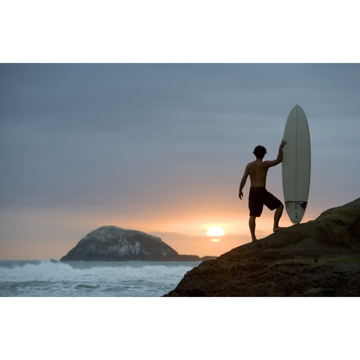 A Surfer On Muriwai Beach Zealand Poster Print Image 1