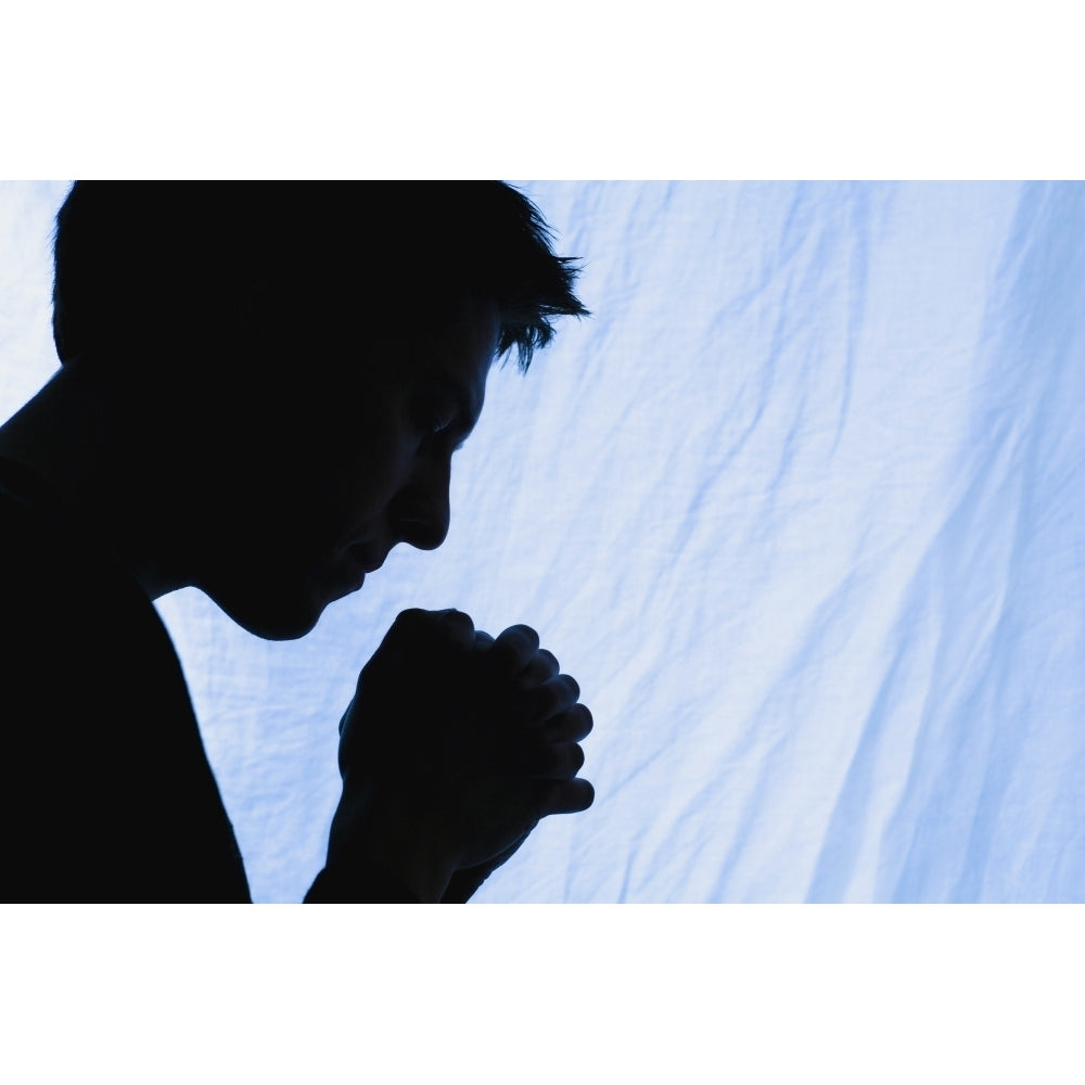 Silhouette Of A Man Praying Poster Print by Chris and Kate Knorr / Design Pics Image 2