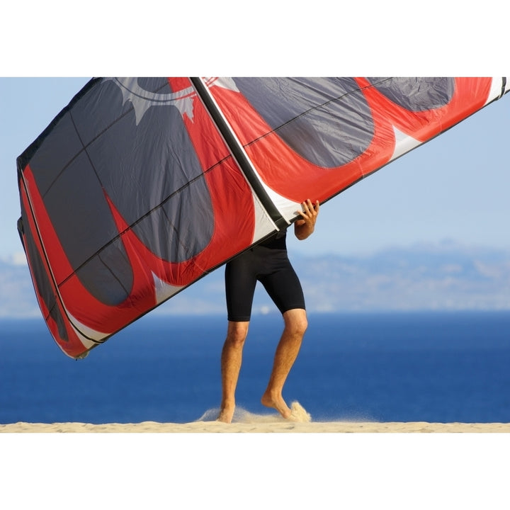 Man Holding Kite For Surfing; Costa De La Luz Andalusia Spain Poster Print Image 1