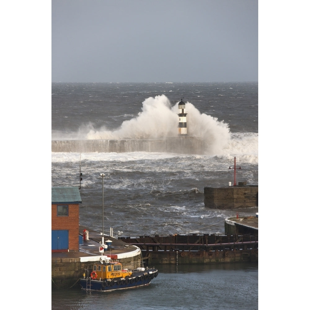 Seaham Teesside England; Waves Crashing Into A Lighthouse And A Boat Along The Pier Poster Print Image 1