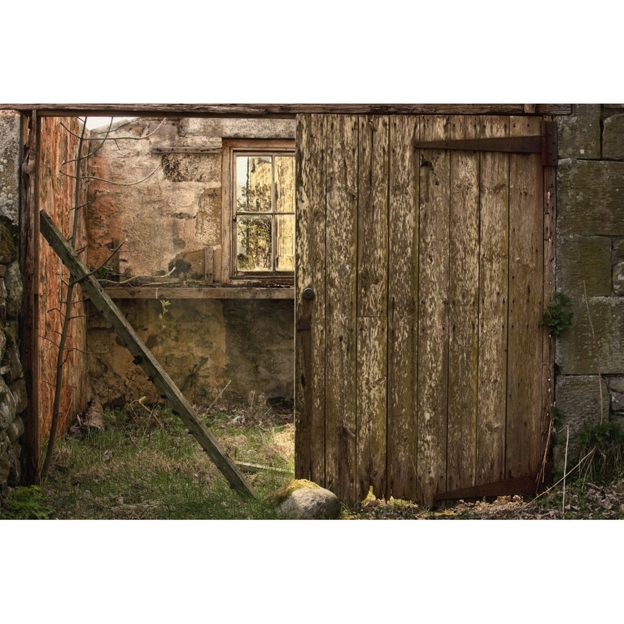 Northumberland England; An Abandoned Building In Ruins With A Broken Wooden Door Poster Print Image 1