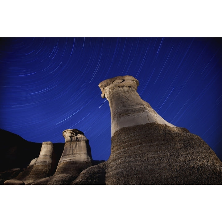 Hoodoos And Star Trails In The Sky; Drumheller Alberta Canada Poster Print Image 1