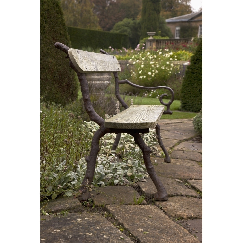 A Park Bench On A Stone Walkway; Northumberland England Poster Print Image 2