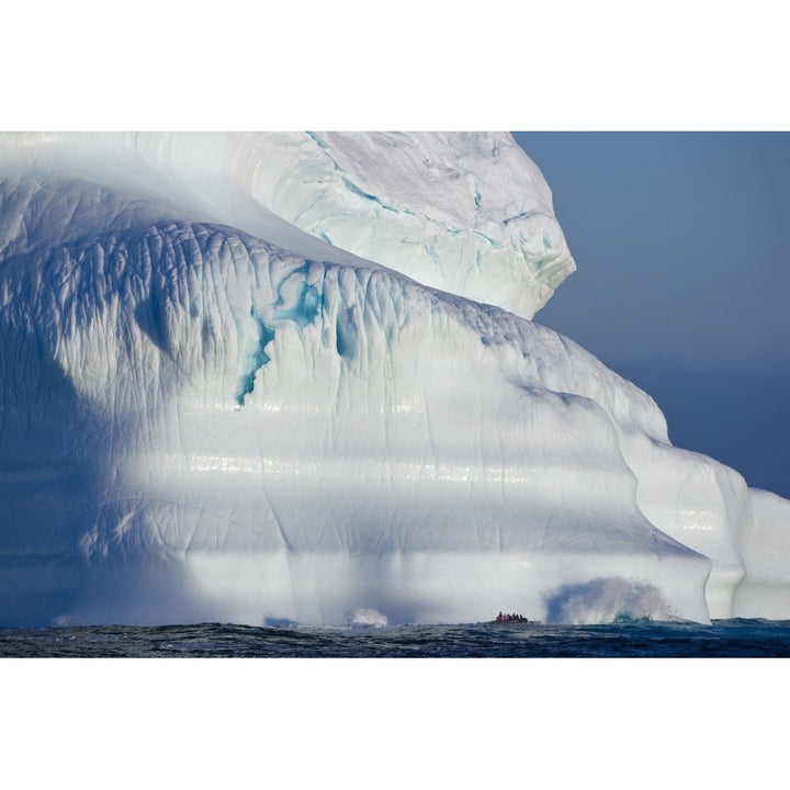 A Composite Image Of Tourists Exploring An Iceberg On Their Journey Throughout Image 2