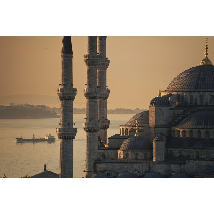 Turkey Ship sailing along Bosphorus behind Sultanahmet or Blue mosque at dawn; Istanbul Poster Print Image 2