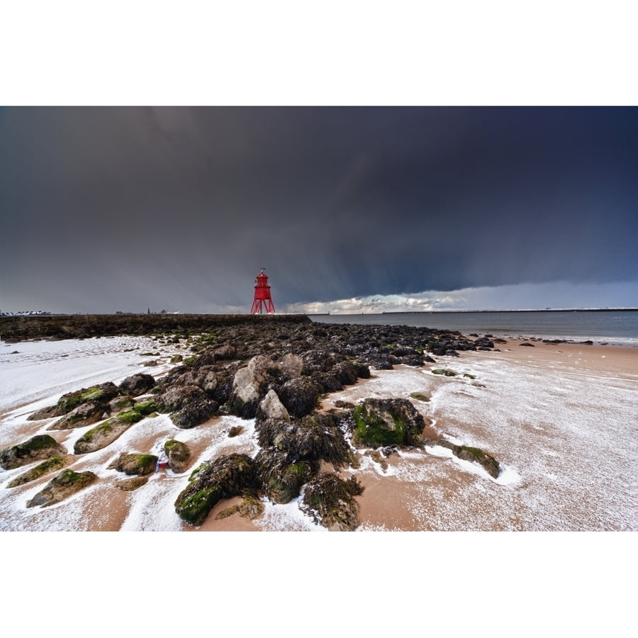 A Red Lighthouse Along The Coast Under A Stormy Sky; South Shields Tyne And Wear England Poster Print Image 1