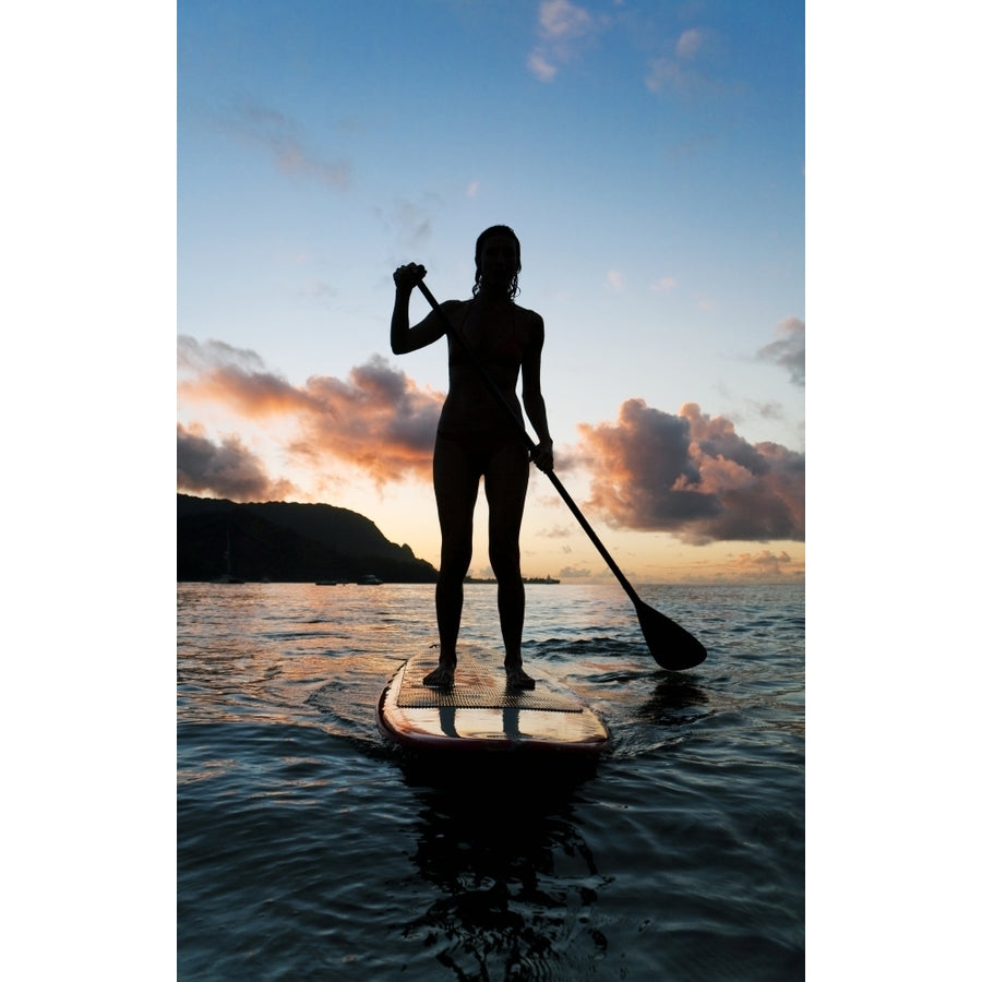 Hawaii Kauai Woman Stand Up Paddling In Ocean Beautiful Sunset. Poster Print Image 1