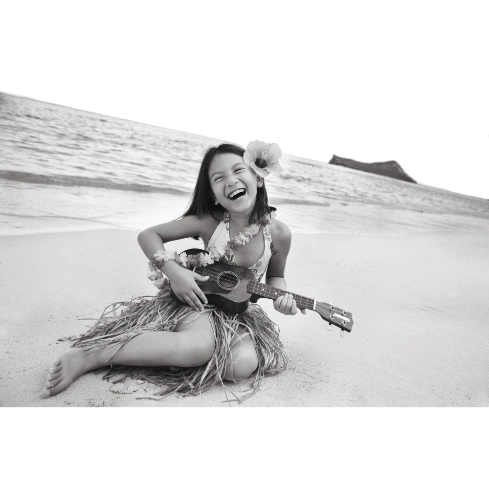 Hawaii Oahu Young Girl Smiling And Playing Ukulele On The Beach In A Hula Skirt. Poster Print Image 2