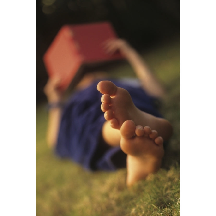 Hawaii Close-Up Of A Mans Feet Reading A Book. Poster Print Image 1