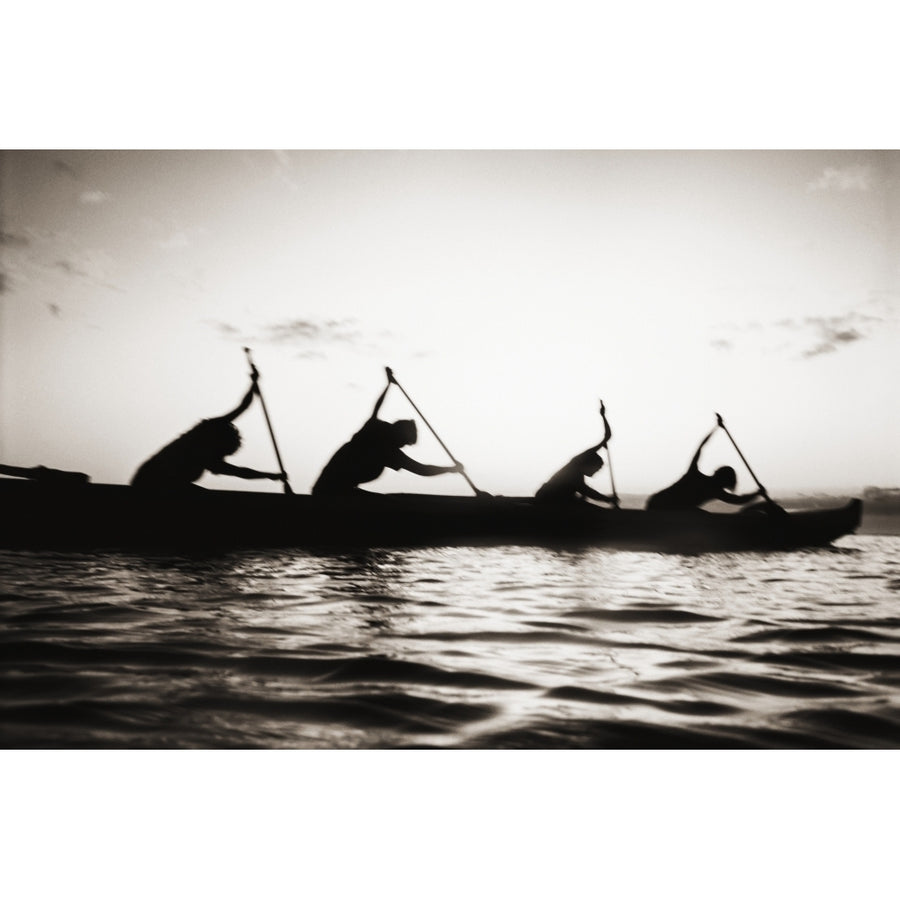 Hawaii Molokai To Oahu Canoe Race Paddlers Silhouetted At Sunset . by Chris Abraham / Design Pics Image 1