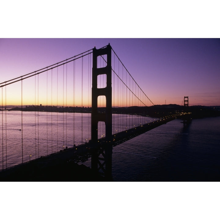 California San Francisco Golden Gate Bridge Silhouetted Against Evening Sky. Poster Print Image 1