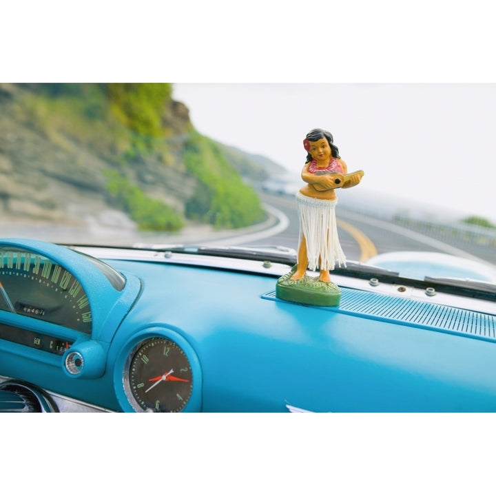 Plastic Hula Doll On The Dashboard Of A Turquoise Thunderbird. Poster Print Image 1