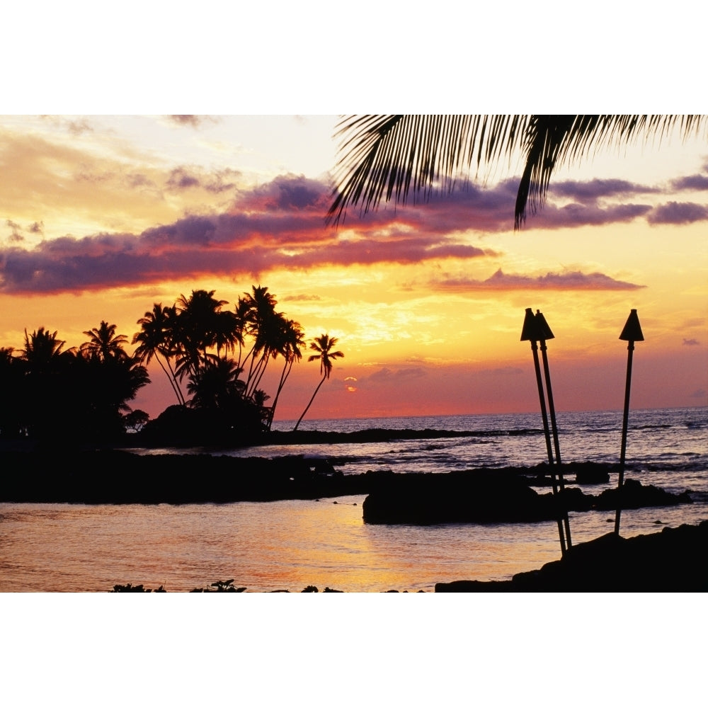 Hawaii Big Island Kohala Waiulua Bay Orange Sunset With Palm Trees And Tiki Torches. Poster Print Image 1