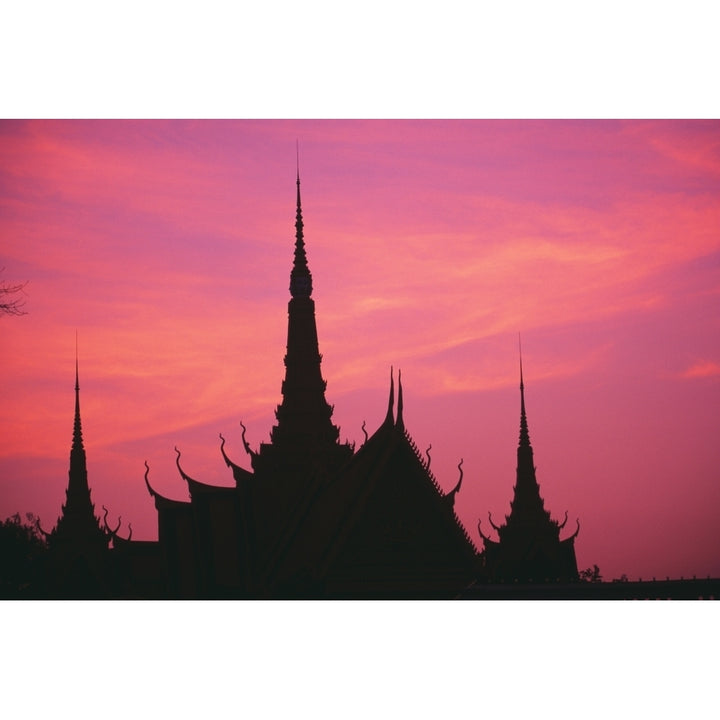 Cambodia Phnom Phen Silhouette Of Palace Architecture At Sunset. Poster Print Image 1