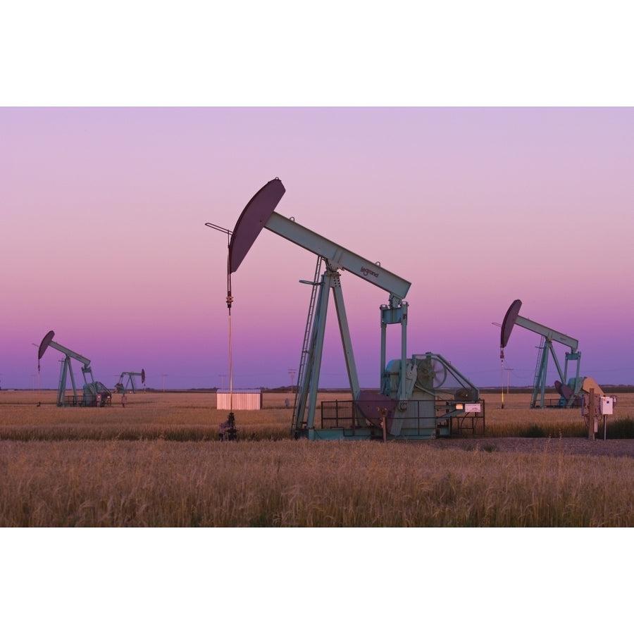 Oil Pump Jacks On Canadian Prairie At Dusk Carlyle Saskatchewan Poster Print Image 1