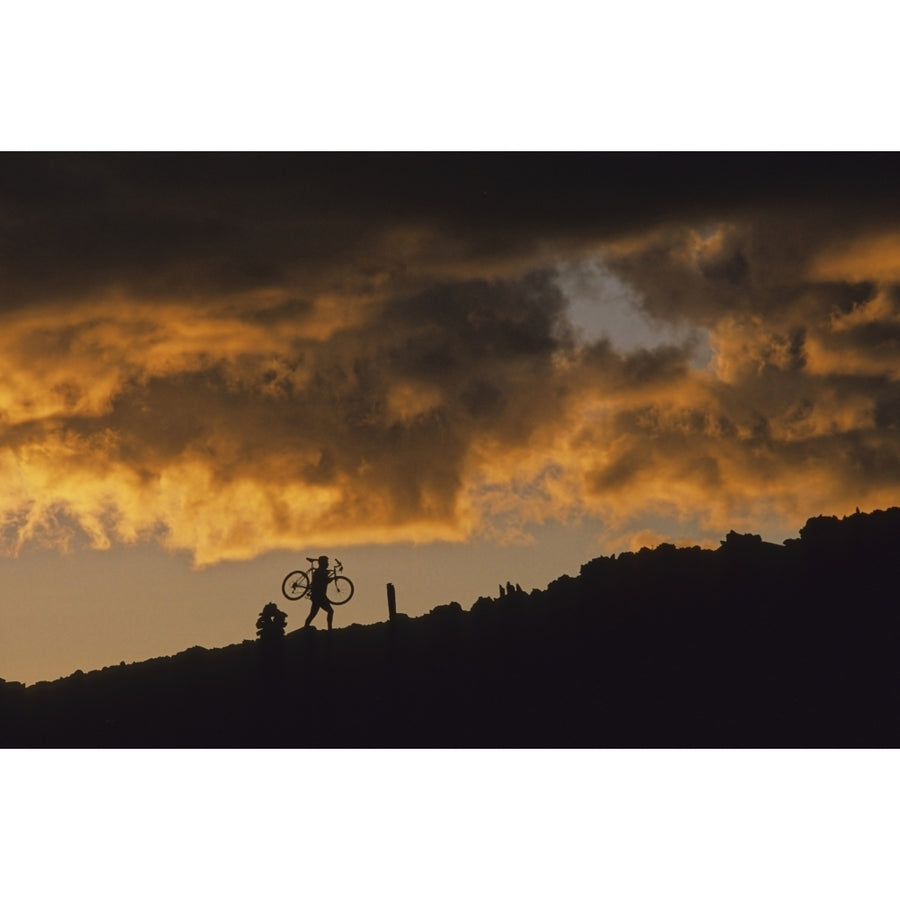 Mountain Biker Carries Bike Up Rocky Slope Sunset Clouds Behind Whistler Bc Canada Poster Print Image 1