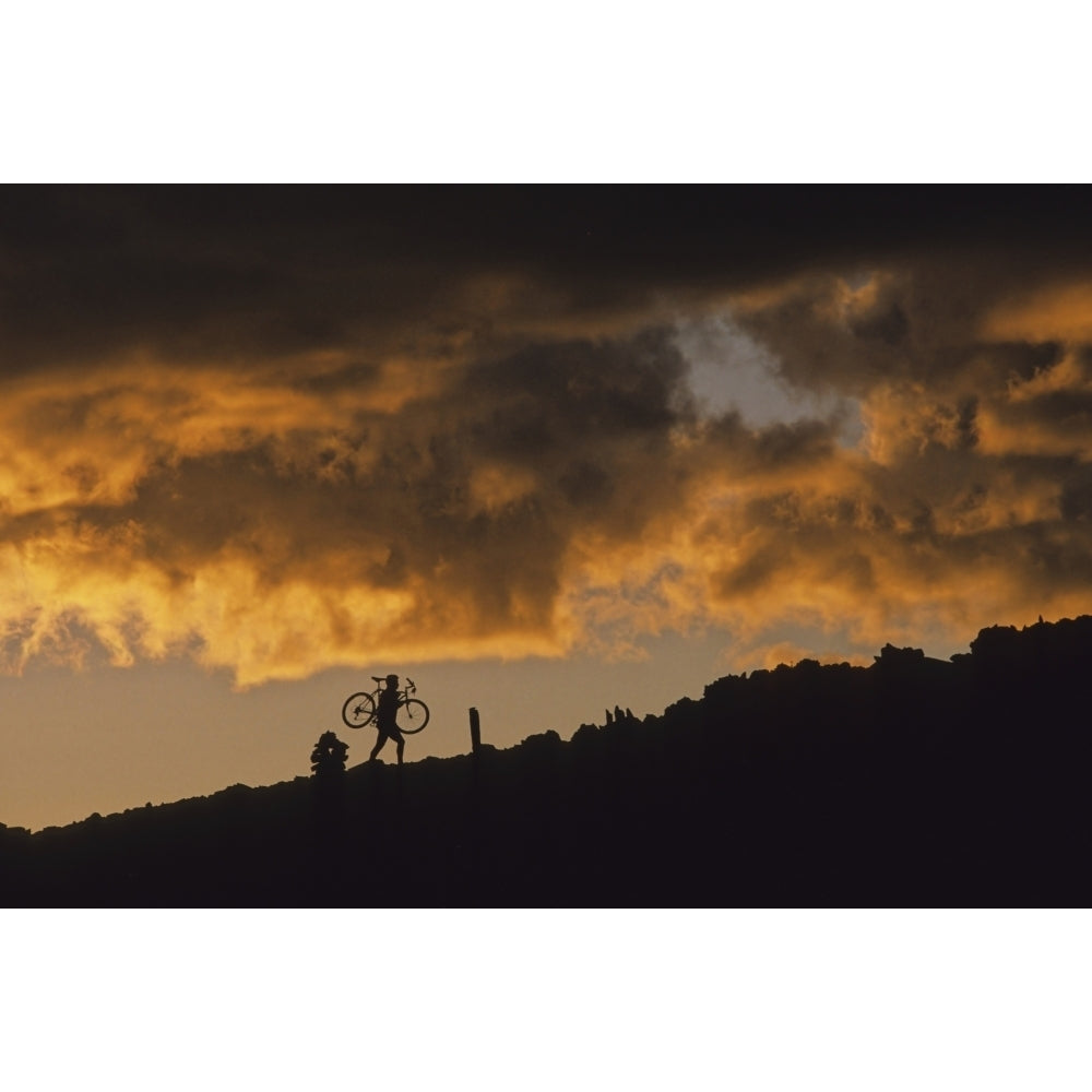 Mountain Biker Carries Bike Up Rocky Slope Sunset Clouds Behind Whistler Bc Canada Poster Print Image 2