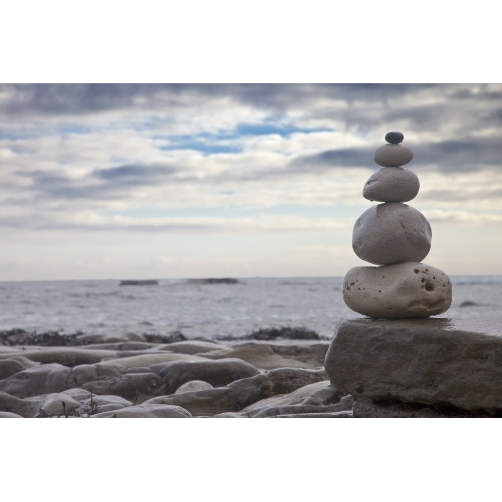 Pile Of Rocks Balanced On A Boulder At The Waters Edge; South Shields Tyne And Wear England Poster Print Image 1