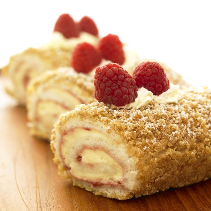 Close-Up Of Three Raspberry Vanilla Jellyrolls With Raspberries On Top. Poster Print Image 1