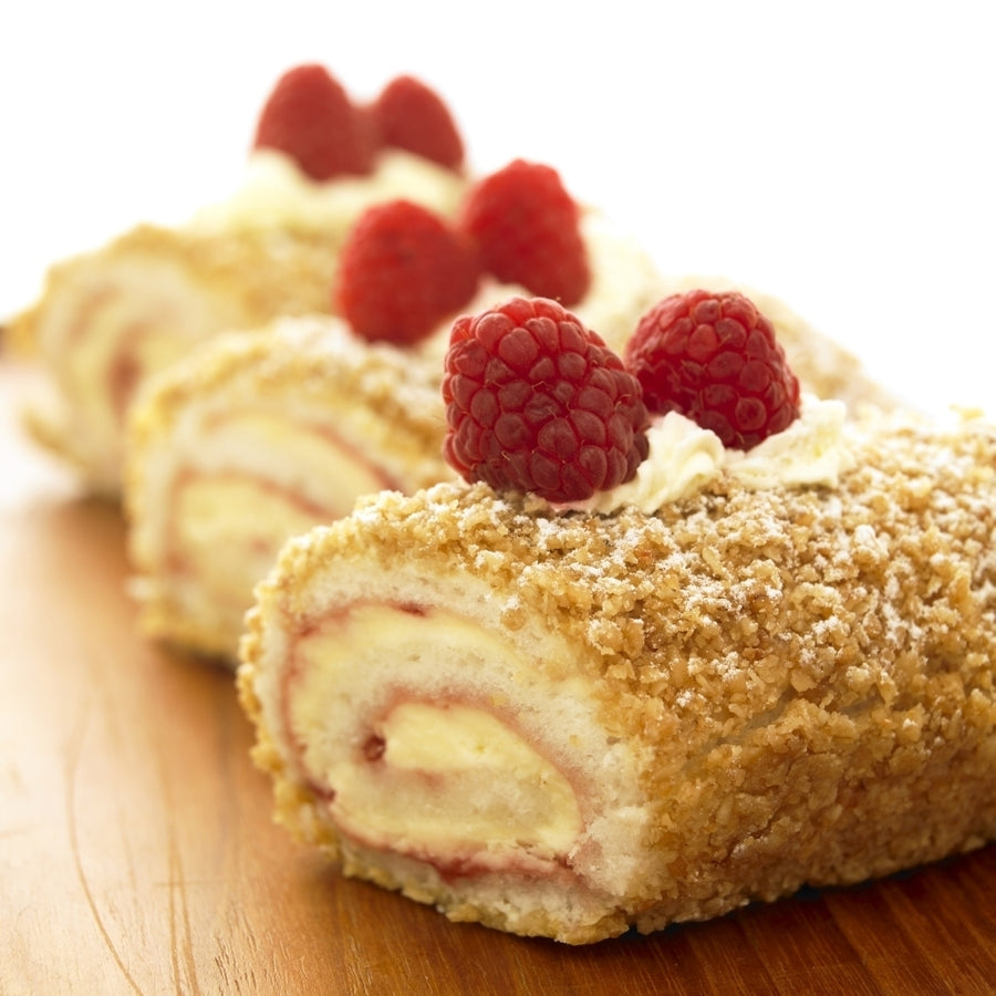 Close-Up Of Three Raspberry Vanilla Jellyrolls With Raspberries On Top. Poster Print Image 1