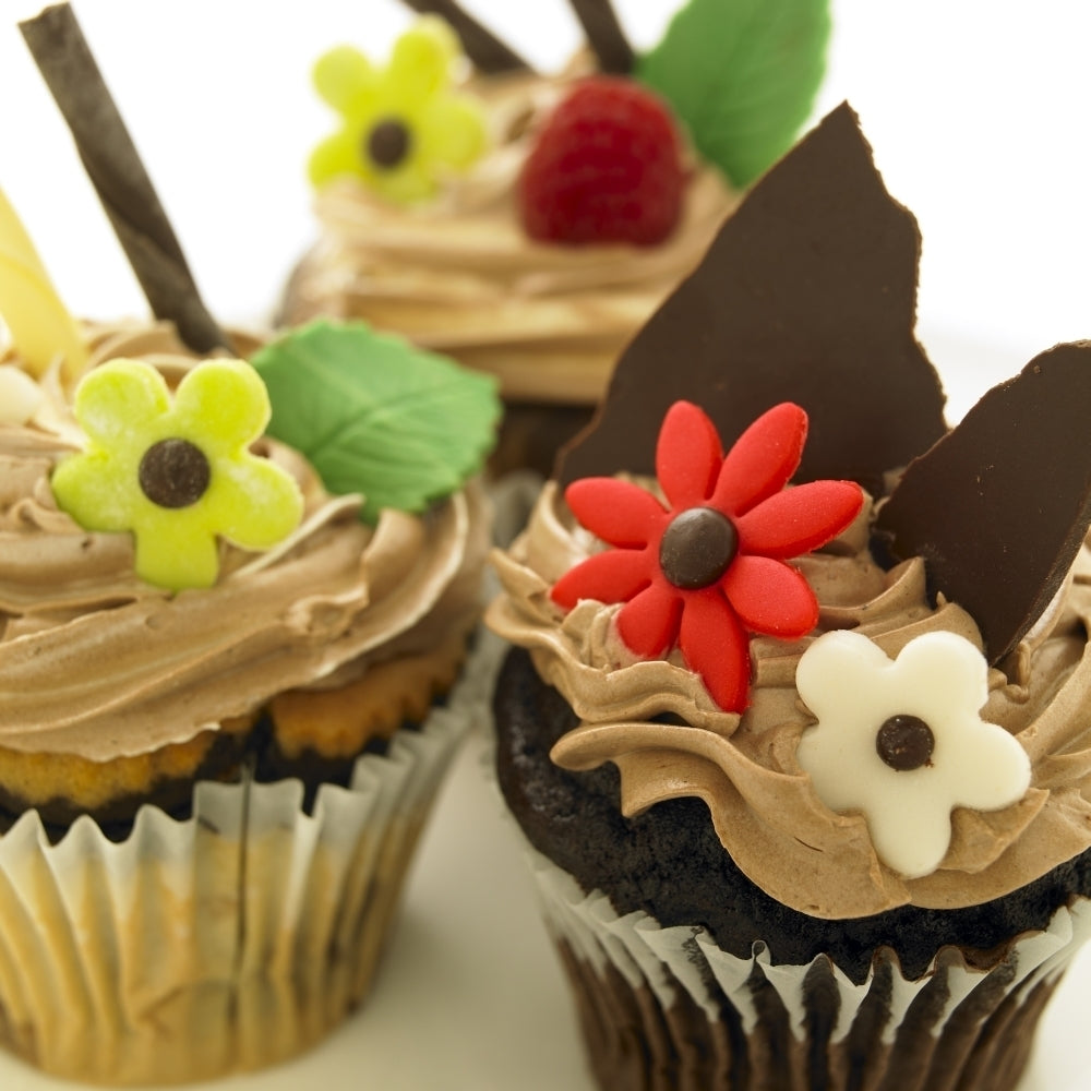 Close-Up Of Three Chocolate Cupcakes With Candy Flowers. Poster Print Image 2