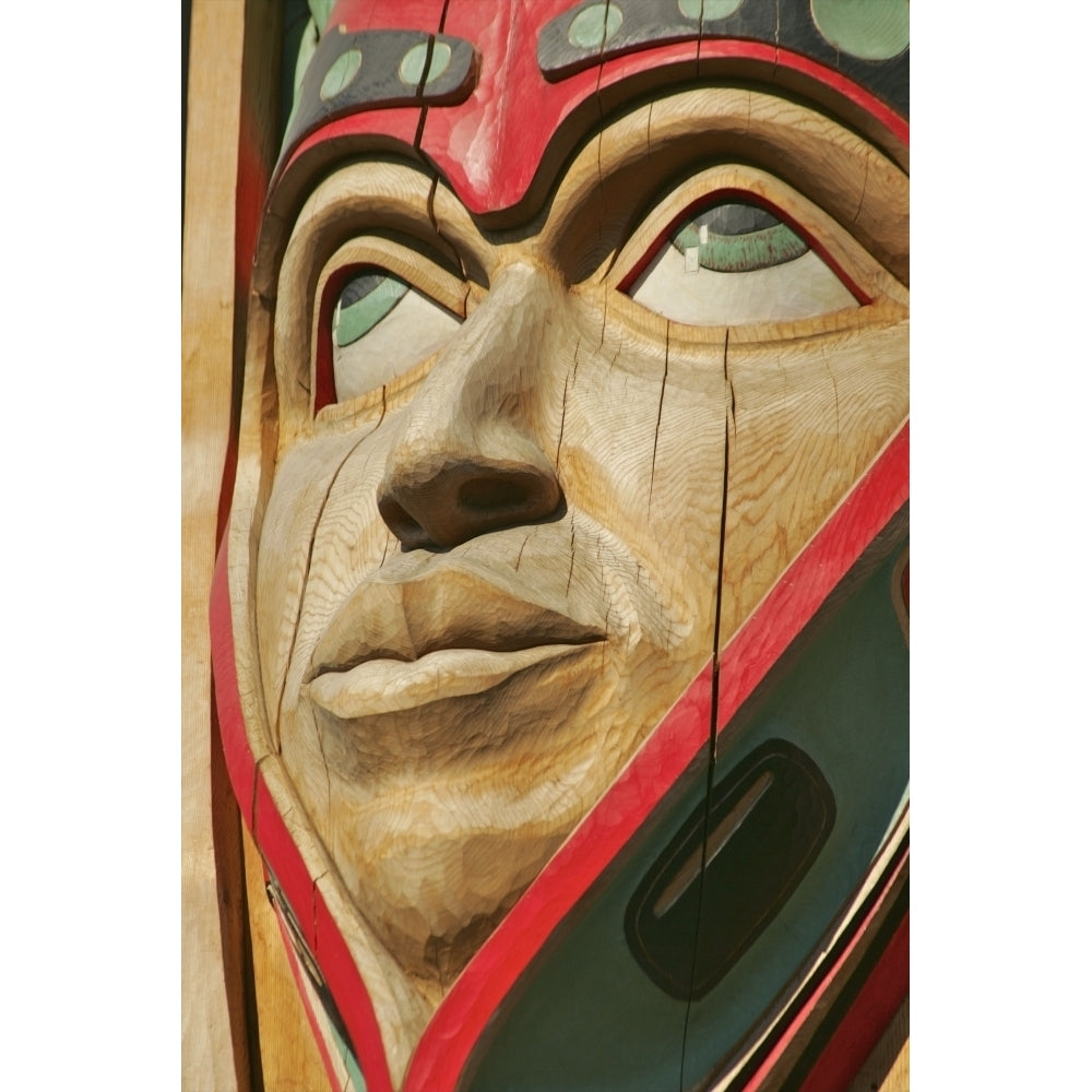 Close Up Of A Face On A Traditional Haida Totem Carving In Ketchikan Alaska Poster Print Image 1