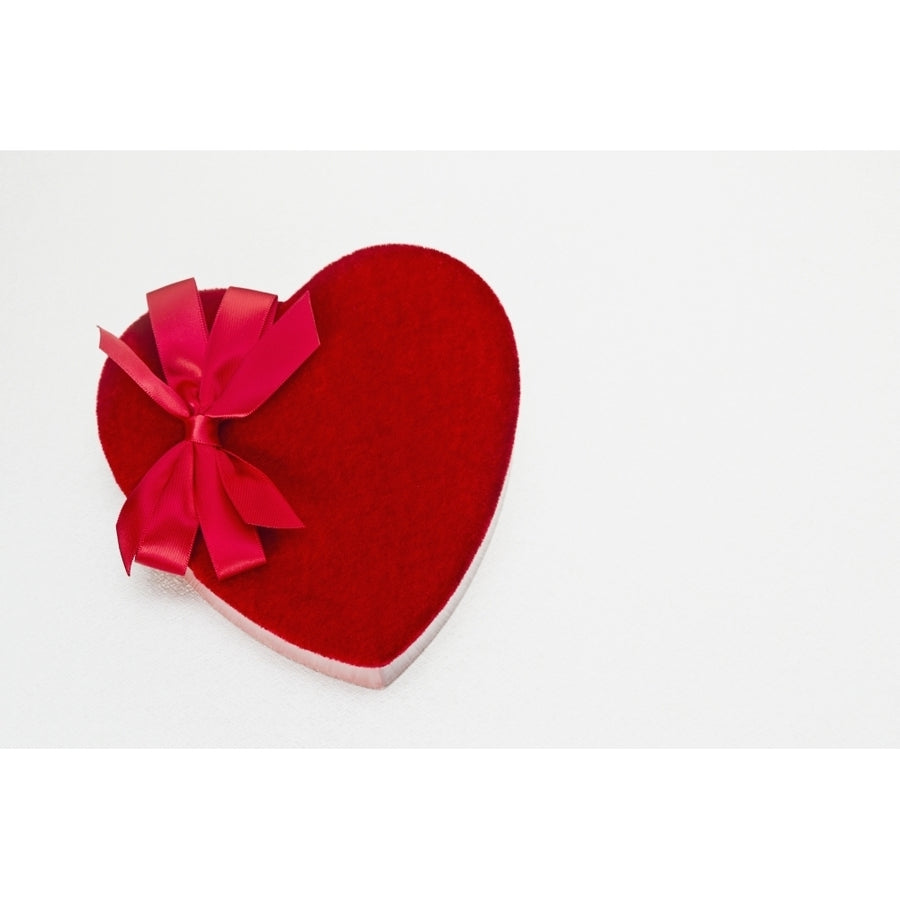 Valentines heart-shaped candy box against white background. Poster Print Image 1