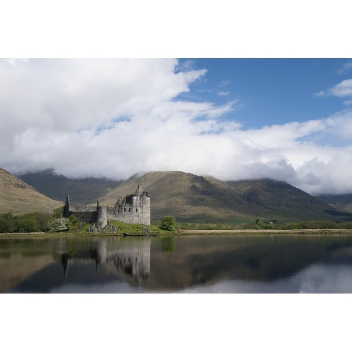 United Kingdom  Scotland  Kilcurn Castle on a peninsula at the end of Loch Awe  Castle reflecting in water. Image 1
