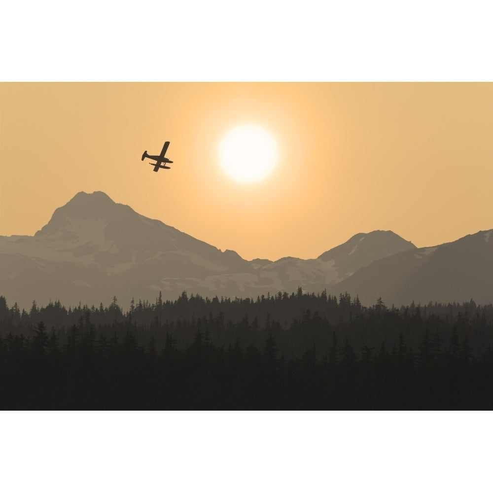 Silhouette Of A Floatplane In Flight Over The Chilkat Mountains At Sunset Tongass National Forest Alaska Image 2