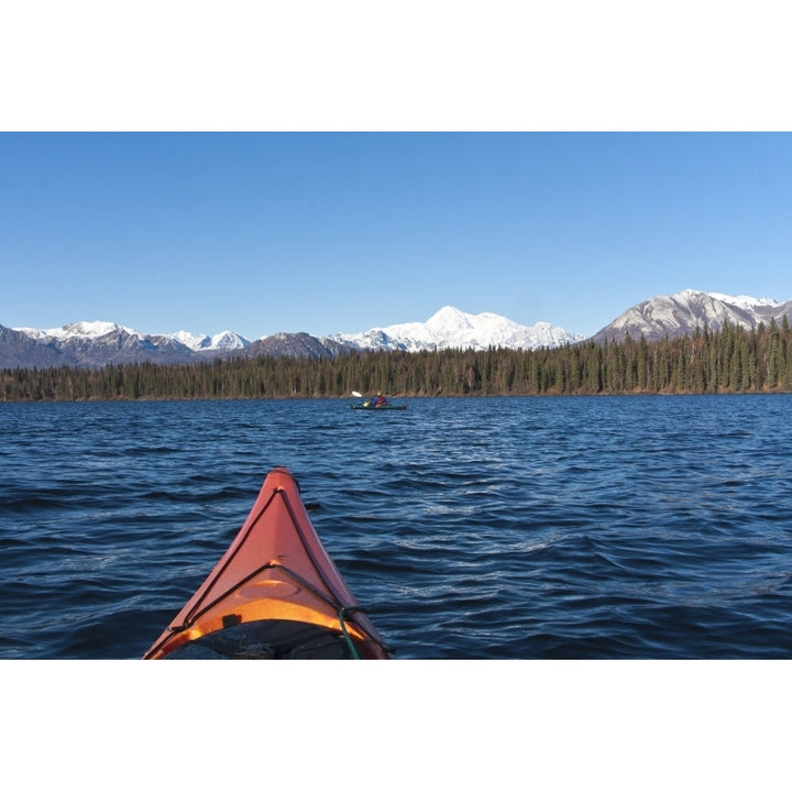 Woman Kayaking In Byers Lake As Seen From Another Kayakers Point Of View With Scenic View Of Mt. Mckinley On A Clear Su Image 1