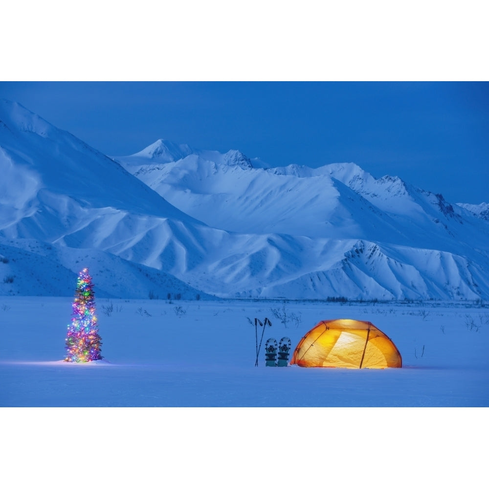 A Backpacking Tent Lit Up At Twilight With A Christmas Tree Next To It Alaska Range In The Distance In Winter Isabel Pas Image 1