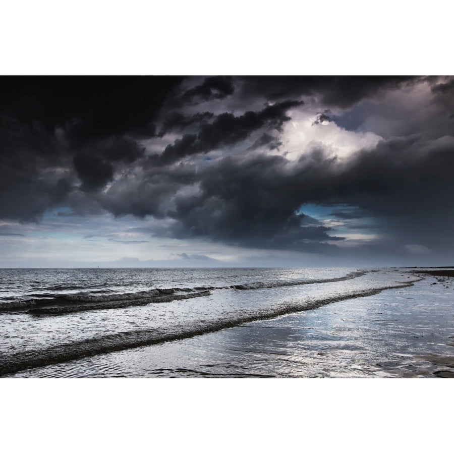 Dark storm clouds over the ocean with waves rolling into the shore;Druridge bay northumberland england Print Image 1