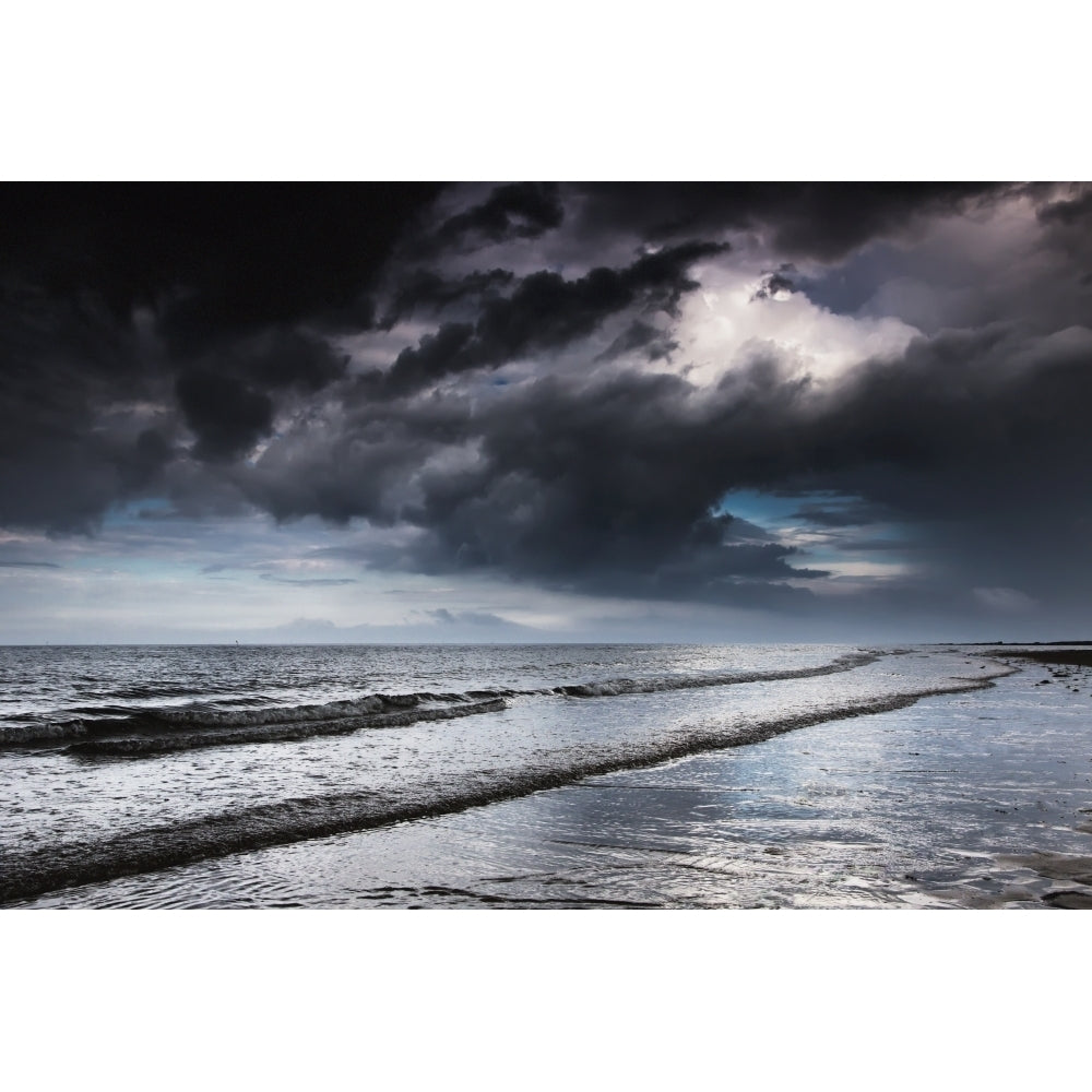 Dark storm clouds over the ocean with waves rolling into the shore;Druridge bay northumberland england Print Image 2