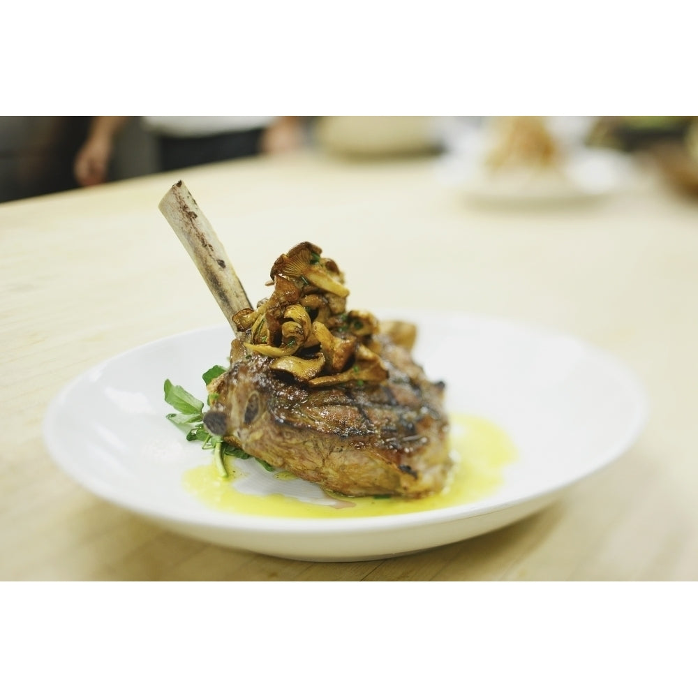 Lamb chop on a plate in a restaurant; boston massachusetts usa Poster Print Image 1